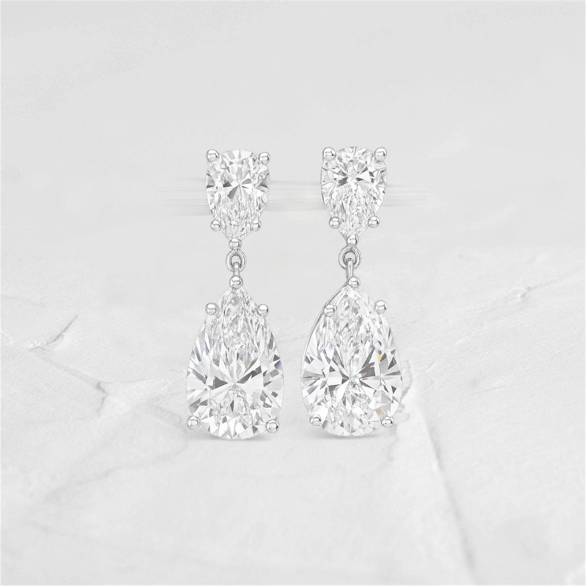 Pear Brilliance Moissanite Drop Earrings - djoyr