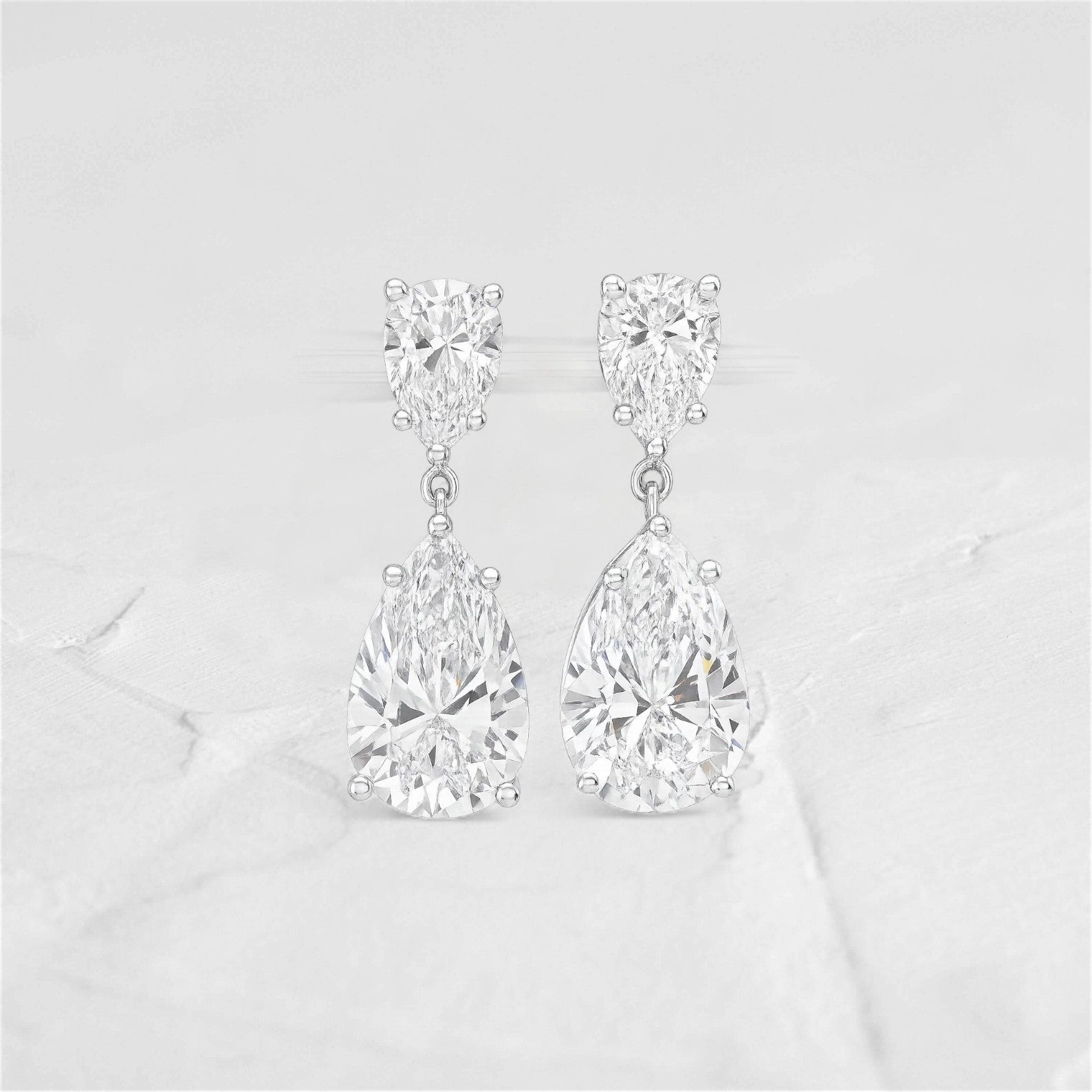 Pear Brilliance Moissanite Drop Earrings - djoyr
