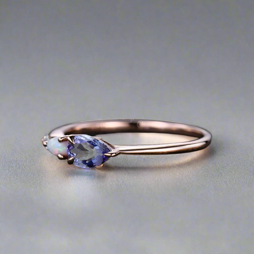 Ring adorned with a Tanzanite opal and white opal, set in rose gold, enhanced by ta moissanite. 