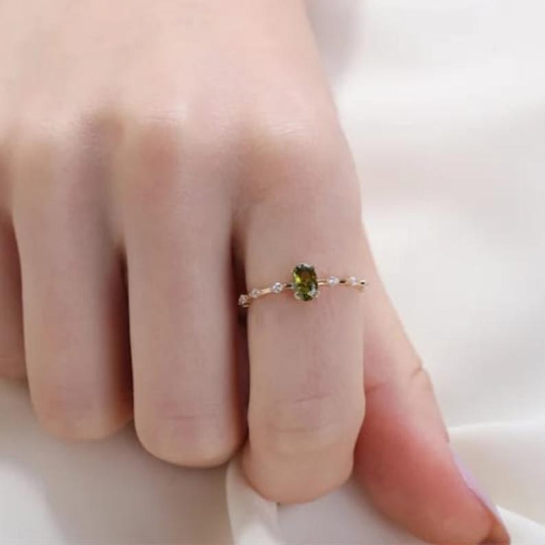 Unveiled Peridot Ring