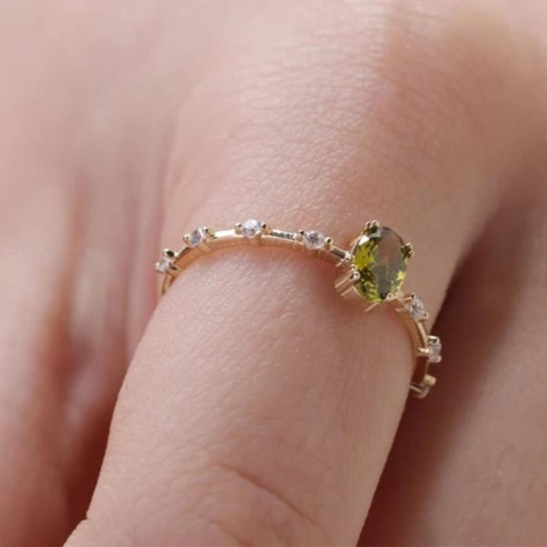 Unveiled Peridot Ring