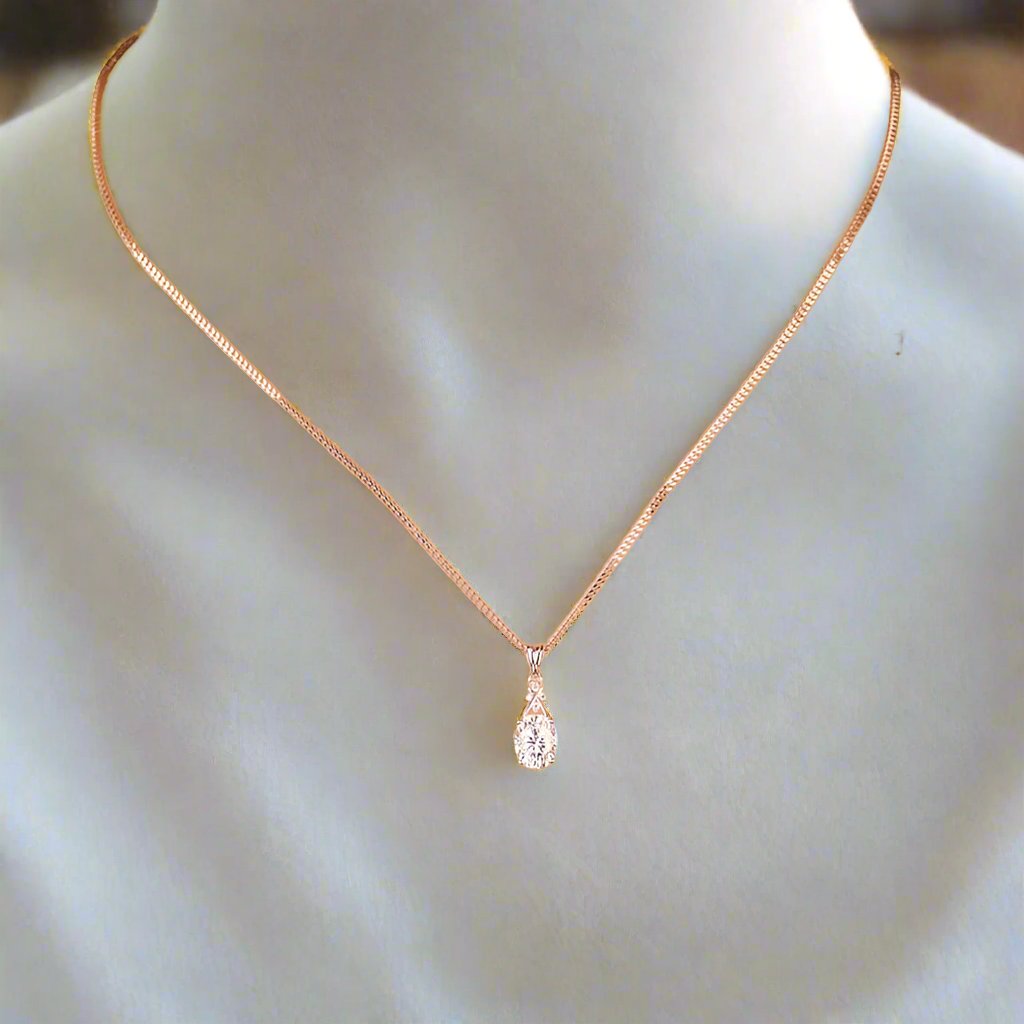 &quot;Elegant pendant with a 6x8mm oval lab-grown diamond centerpiece, known for its brilliance and eco-friendly appeal. Features 0.02CT lab-grown diamond accents for added sparkle. Paired with a 1mm gold chain, available up to 24 inches in length.&quot;








