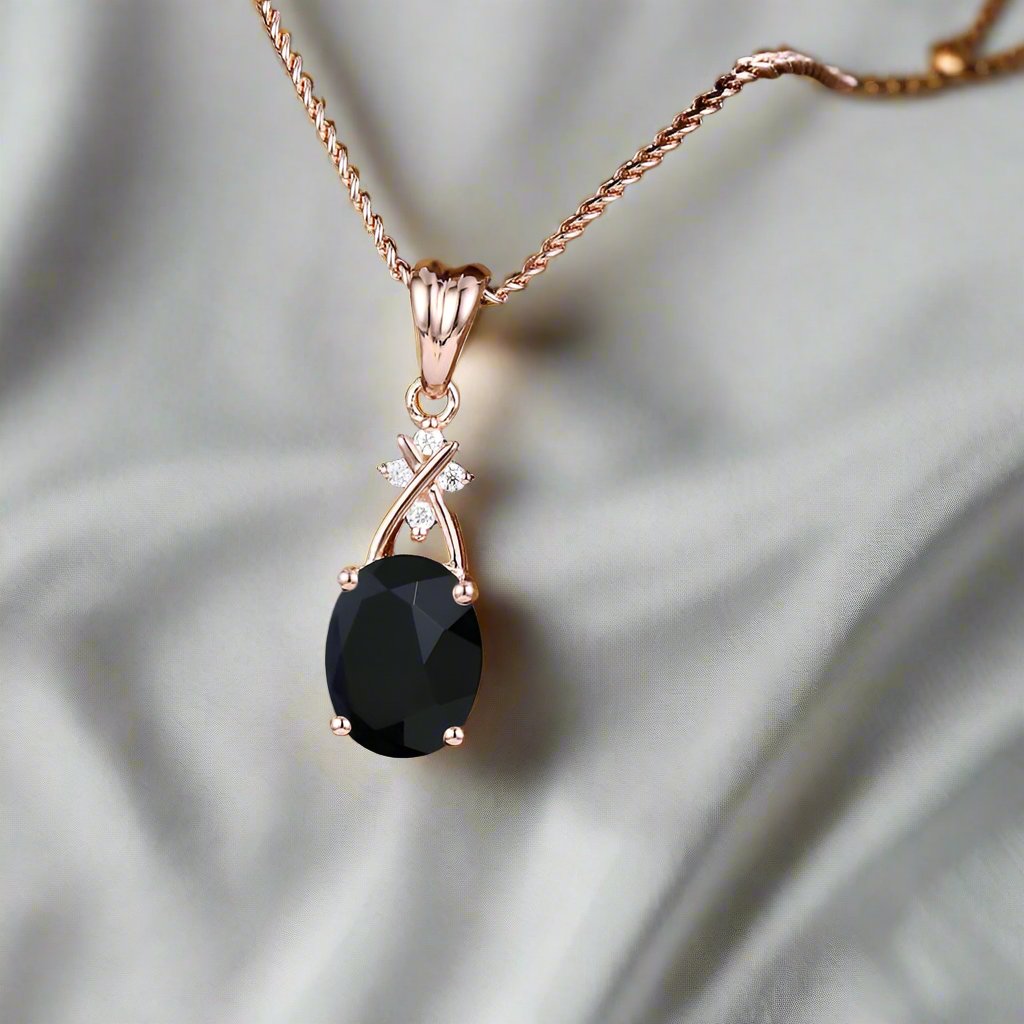 elegant pendant with 6x8mm oval-cut black onyx centerpiece and 0.02CT lab-grown diamond accents, set on a 1mm gold chain up to 24 inches long