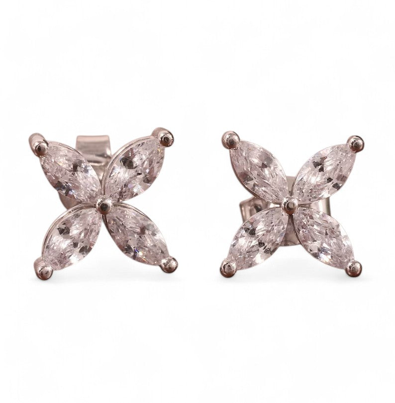 Pair of marquise-cut lab-grown diamond stud earrings with push-back closure, featuring mid-century inspired design. Each diamond measures 6x3mm, with EF color and VVS clarity for exceptional sparkle."